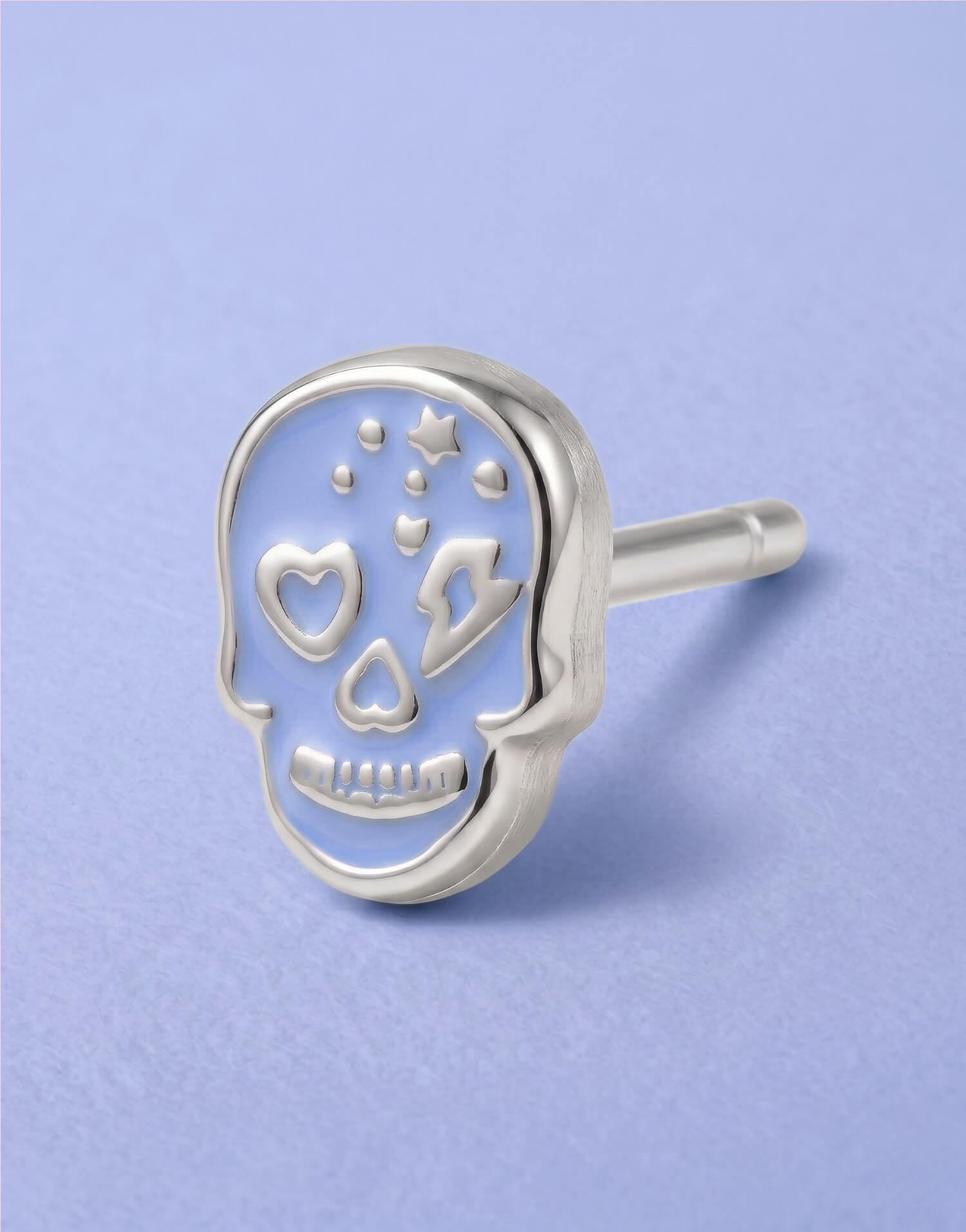 Piercing azul calavera